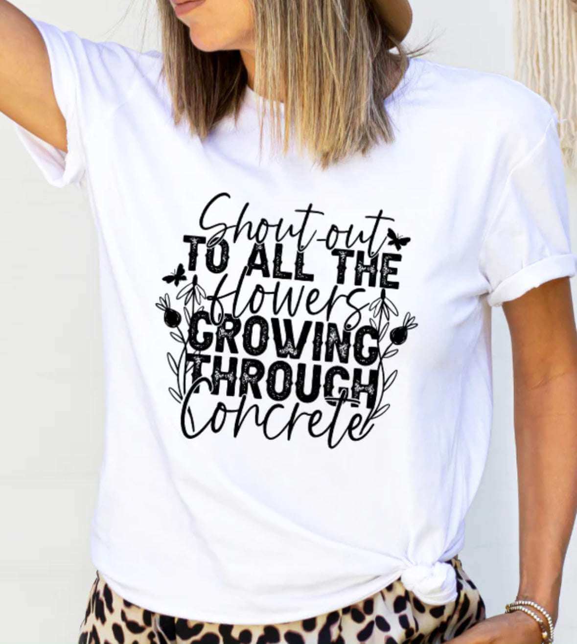 Floral Resilience T-Shirt – “Shout to All the Flowers Growing Through the Concrete” | Inspirational Quote Tee | Custom Color | Unisex Sizes S - 2XL - Daisy Designs & Creations, LLC
