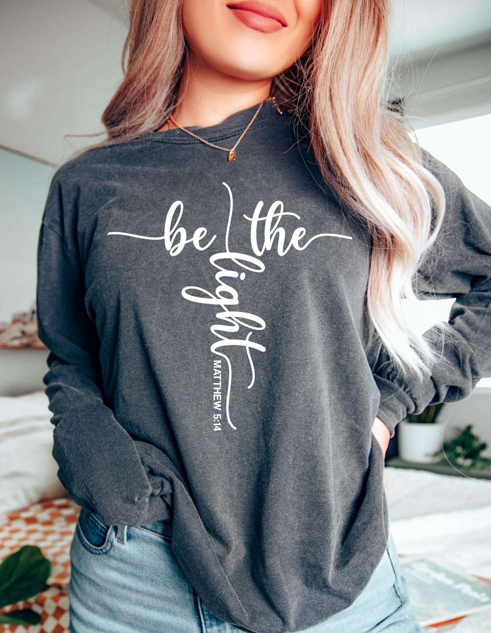 Be The Light Crewneck - Illuminate the World with Style and Positivity! 💡👕 Crewnecks & Hoodies Crewneck 35 Daisy Designs & Creations LLC