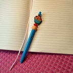 Sweet Heart Cupcake-Bright blue cupcake with heart sprinkles and playful dessert charm.