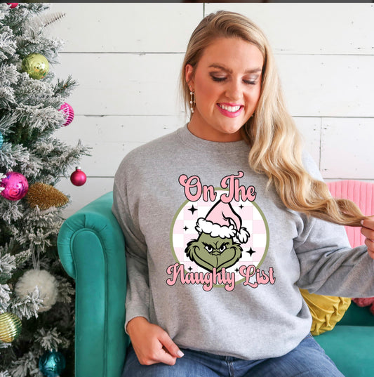 On The Naughty List T-Shirt & Crewneck – Green Guy with Pink Santa Hat Holiday Design