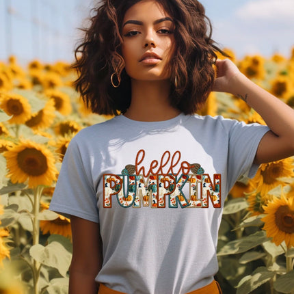 Gray T-shirt with Hello Pumpkin graphic featuring autumn-colored patterned lettering and small pumpkin details.
