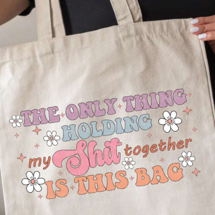 Pastel Spring Colors Canvas Tote Bag: 'The Only Thing Holding My Sh*t Together' Design - Daisy Designs & Creations, LLC