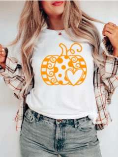 Pumpkin Heart graphic t-shirt featuring a heart-shaped pumpkin design on a soft premium tee, perfect for cozy fall outfits and autumn adventures.