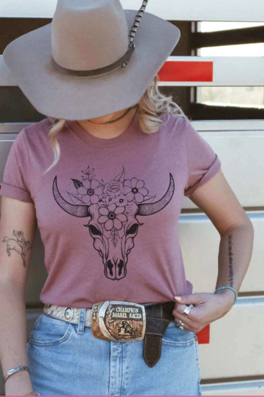 Wildflower Cow Skull T-Shirt - Embrace Nature's Beauty with Floral Charm Dress Your Story: Explore our Diverse T-shirt Collection - Humor, Inspiration, Professions, Retro, Boho, and Country Advocacy in Vibrant Colors, Sizes, and Styles Shirts & Tops 22 Daisy Designs & Creations LLC